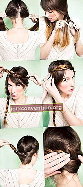 Una giovane donna con lunghi capelli castani mostra come realizzare una corona di capelli intrecciati bassi