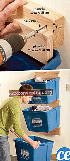 Gunakan potongan kayu untuk menggantung tempat sampah daur ulang dan menghemat ruang di garasi Anda.