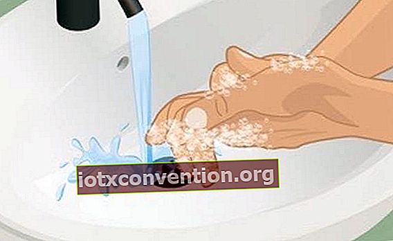 Illustrazione del lavaggio delle mani sotto un flusso di acqua di rubinetto.