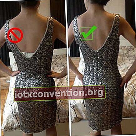 menyembunyikan bagian belakang bra dengan gaun berpotongan rendah
